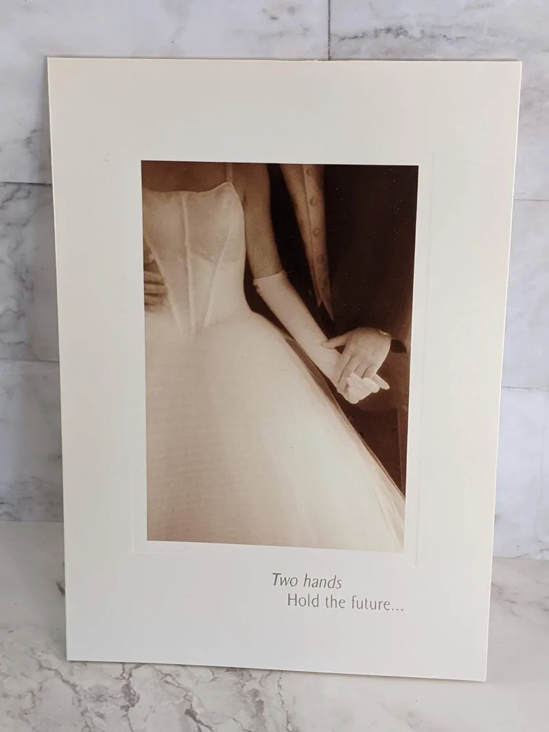 Two Hands Hold the Future Card